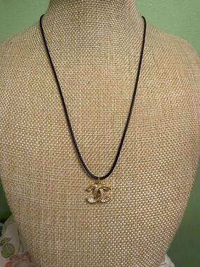 Gold Interlocking Pendant Necklace on Black Cord